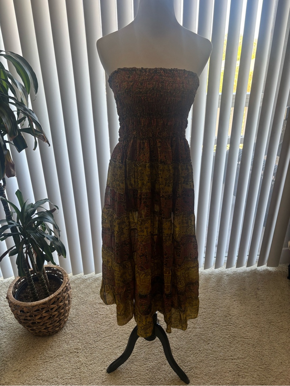 Smocked Strapless Midi Dress in a gold tone and Rust Paisley pattern.